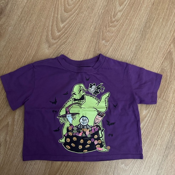 Disney Other - Disney Purple Graphic Tee with Green and Black Design